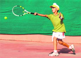 Reaching for success: Ronak Singh in action during the AITA Total Tennis Tournament at Dikshant School, Sector 12, Panchkula, on Thursday