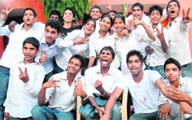 We have done it Members of the Theatre Age in a jubilant mood at the government school, Sector 24-A, after the declaration of the CBSE class X result in Chandigarh on Thursday