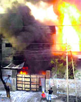 A file photo of a fire that broke out recently in a paint factory at MIE in Bahadurgarh.