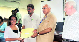 HS Chahal, Vice-Chancellor, Murthal University, presents an appointment letter to a student at a function in Sonepat.