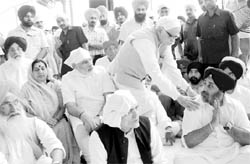 BJP leader LK Advani offers condolences to Deputy Chief Minister Sukhbir Singh Badal during the bhog ceremony of his mother Surinder Kaur Badal at Malout on Thursday