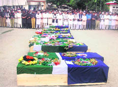 Pakistani police officials offer funeral prayers for colleagues killed during a gunbattle with Taliban in the northwestern district of Upper Dir on Thursday.