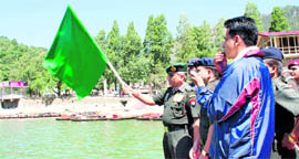 Gen VK Singh flags off the regatta at the Boat Club House, Nainital, on Friday.
