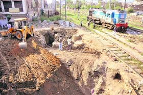 Going slow Work on at the Lakkar bridge project in Ludhiana