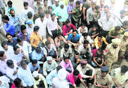 People await their turn during the quarterly lok adalats at the District Courts in Sector 17, Chandigarh, on Saturday