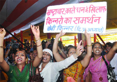A group of eunuchs expresses its support for yoga guru Baba Ramdev at the site of a yoga camp in New Delhi