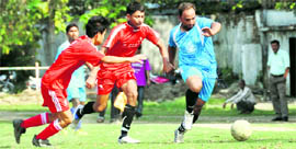 A match in the Lala Nemi Dass Memorial District Football League in Dehradun on Saturday. 