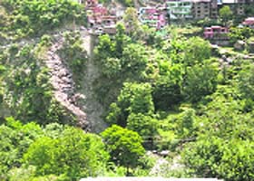 A view of the nullah from where waste is dumped into the Jhibhi river