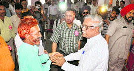 CPI leader Gurudas Dasgupta meets people during a one-day convention of the All-India Trade Union Congress in Jammu on Saturday.
