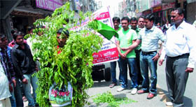 The commissioner of the Bathinda Municipal Corporation (BMC) Uma Shankar flags off a rally on the occasion of the World Environment Day in Bathinda on Sunday.