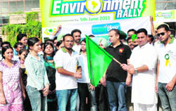 Students hold a rally to mark the World Environment Day in Patiala on Sunday. 
