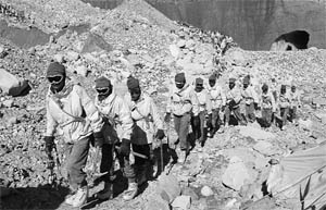 Indian troops train at the Siachen Battle School prior to induction in to the battle zone. Based upon intelligence inputs that Pakistan was planning to occupy Siachen, the Indian army moved into the glacier in 1984 and with continuous deployment since then, built up a number of permanent posts and helipads on what is known as the world’s highest battlefield