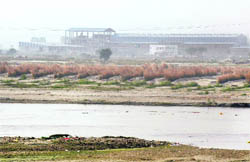 An industrial unit on the riverbed of the Swan in Una district