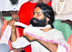 Baba Ramdev during a press conference in Haridwar on Sunday
