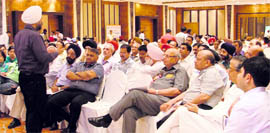 Members of the Rotary Club at a function held in Ludhiana on Sunday.