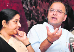 BJP leaders Sushma Swaraj and Arun Jaitley address a press conference in New Delhi on Sunday