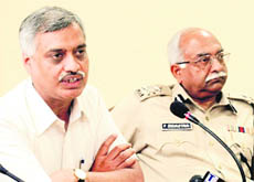 Satyendra Garg (left), Joint Commissioner (Traffic), Delhi, flanked by Inspector-General of Police, Chandigarh, Pardeep Kumar Srivastava, addresses mediapersons at the Chandigarh Police Headquarters, Sector 9, Chandigarh