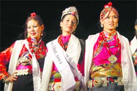 Tenzin Yangkyi from Switzerland (centre), who was crowned Miss Tibet at McLeodganj on Sunday