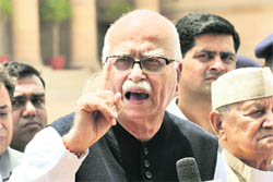BJP leader LK Advani speaks to the media after submitting a memorandum to President Pratibha Patil in New Delhi on Monday. 