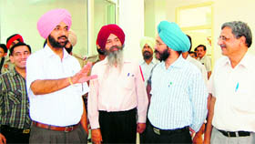 Deputy Commissioner Kahan Singh Pannu inspects the newly opened suvidha centre at the Civil Hospital in Amritsar on Tuesday.