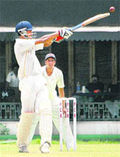 fetch it A batsman hits the ball during a match at the PCA stadium in Mohali on Tuesday.
