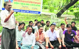 Members of the Scheduled Castes cell of the BJP hold a demonstration at Gandhi Park in support of their demands in Dehradun on Tuesday