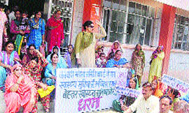 Residents protest in front of the Sarkaghat hospital on Tuesday.