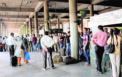 Passengers wait for buses at the ISBT, Sector 17, in Chandigarh on Wednesday