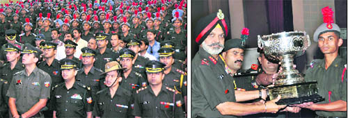 Gentlemen Cadets of the Indian Military Academy at the awards function in Dehradun on Wednesday; and (right) Lt-Gen RS Sujlana, Commandant, IMA, presents the Naval Chief of Staff trophy to Vimal Roy for standing first in physical endurance.
