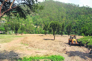 Work in progress at Sadhupul village in Solan district where Patanjali Yogpeeth is coming up.