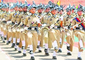 Policemen perform a riot drill at the Lethpora Commando Training Centre, 20 km from Srinagar, on Wednesday