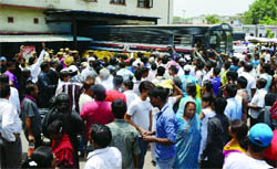 People gather near the spot where two groups of undertrials clashed at the Tis Hazari Court complex in New Delhi on Thursday