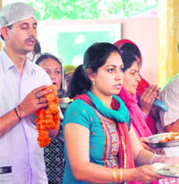 Devotees offer prayers at Mata Khir Bhawani Temple in Jammu 