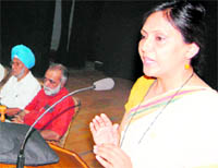 Neeta Mohindra addresses a gathering during a meeting in Amritsar