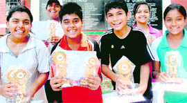 Winners of the tennis tournament in a jubilant mood at Yadavindra Public School, Mohali, on Friday.