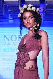 Femina Miss India World 2011 Kanishtha Dhankar unveils Nomarks Refreshing Beauty Fashion Show by Nitya Bajaj in New Delhi on Friday.