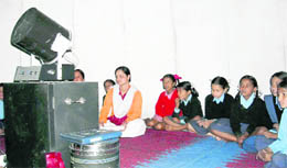 Students of Mussoorie Girls Inter College watch the solar system through a mobile planetarium at Mussoorie on Friday. 
