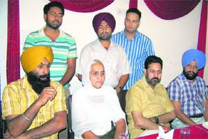 Panchayat members of Shyampura village address mediapersons at Ropar 