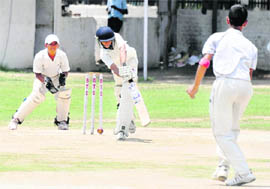 A player of NICS, Patiala, plays a shot against DP Azad Cricket Academy at the 3rd Ashok Kumar Vij Memorial Cricket Tournament in Chandigarh 