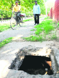 An uncovered manhole on the cycle track in Secror 11 of Chandigarh