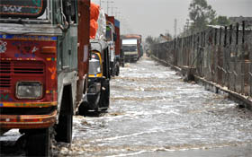 A waterlogged service lane along NH-8 near Hero Honda Chowk in Gurgaon on Saturday.