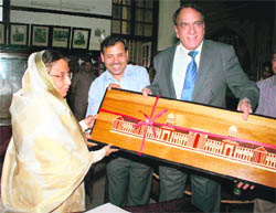 President Pratibha Patil being presented a memento of the Forest Research Institute building by Dr VK Bahuguna, Director-General, Indian Council of Forestry Research and Education, in Dehradun 