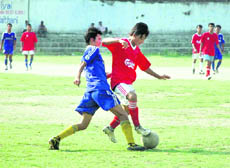 A match in Lala Nemi Dass Memorial District Football League being played at the Pavilion Ground in Dehradun 