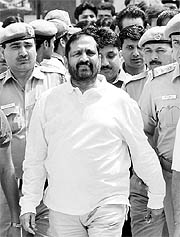 Suresh Kalmadi, Congress MP and CWG Organising Committee,being produced at the Patiala House court.
