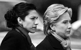 Will Huma Abedin (left) stand by her man as her boss, Hillary Clinton (right) once did? 