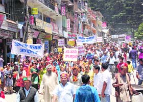 Residents hold a protest in Manali on Saturday