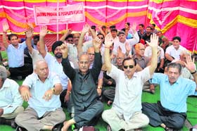 Members of the Jammu Province Peoples Forum stage a protest in Jammu on Saturday