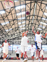 Players in action during a match between Patiala and Gurdaspur in the 62nd Junior Punjab State Basketball Championship at the Guru Nanak Sports Complex in Ludhiana on Saturday