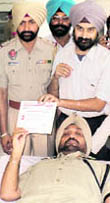 DSP Rajinder Singh donates blood at a camp in Nakodar on Friday