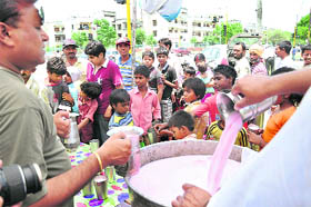 Devotees take sweetened water on the occasion of Nirjala Akadashi in Sector 49, Chandigarh, on Sunday.